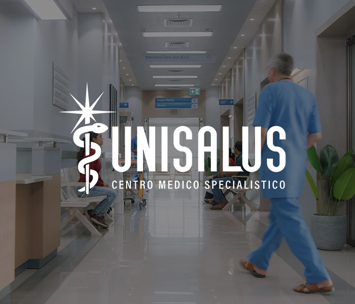 Corridoio di un ospedale con in sovrapressione il logo del Centro Medico Unisalus